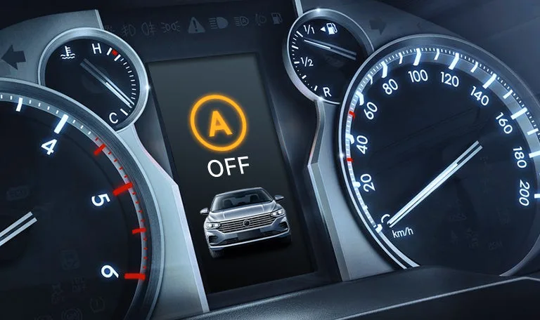 Instrument cluster showing the auto start/stop off indicator